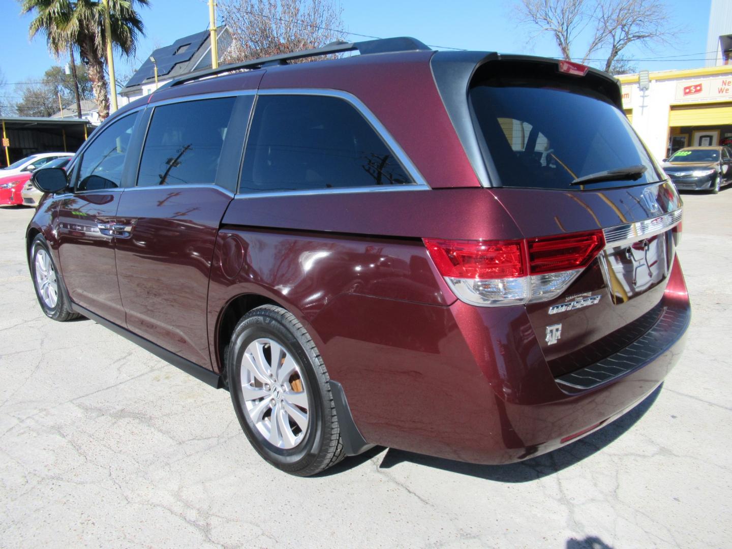 2016 Red /Tan Honda Odyssey EX-L (5FNRL5H62GB) with an 3.5L V6 SOHC 24V engine, Automatic transmission, located at 1511 North Shepherd Dr., Houston, TX, 77008, (281) 657-1221, 29.798361, -95.412560 - 2016 HONDA ODYSSEY EX-L VIN: 5FNRL5H62GB103369 5 F N R L 5 H 6 2 G B 1 0 3 3 6 9 VAN 3.5L V6 F SOHC 24V GASOLINE FRONT WHEEL DRIVE - Photo#30